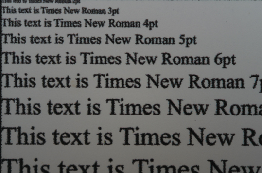 This picture shows the resolution from a High Quality print. Text at 3pt is just about legible, and this is also true when printed white on black.