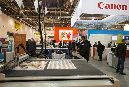 Consider who offers complete solutions, including the finishing, such as this Canon ProCut.